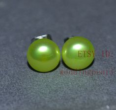 jewelry : dyed green pearl earrings earring material: freshwater pearl earring characteristics: pearl earring stud pearl grade: AA+ Metal material: stainless steel pearl body: with tiny blemishes pearl luster:high pearl shape: button pearl size: 8mm pearl colour: green packaging: beautiful pouch Thank you for your viewing.If you hae question,Please contact me. Matching necklace: Green Round Pearl Earrings For Formal Occasions, Green Pearl Earrings For Formal Occasions, Green Pearl Earrings For Wedding, Green Round Pearl Drop Earrings, Green Pearl Drop Round Earrings, Green Pearl Earrings For Gift, Green Pearl Earrings As Gift, Green Round Beaded Earrings For Wedding, Green Round Beads Earrings For Wedding