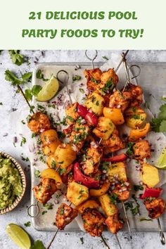 chicken and pineapple kabobs on a platter with guacamole