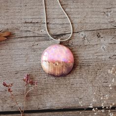 "Beautiful opal necklace to add a pop of pink color to your look. Unique statement necklace makes a perfect anniversary gift for her. W H Y ∙ Y O U ∙ W I L L ∙ L O V E ∙ I T ✧ A Wood-all-Good Original, designed and handcrafted by us ✧ A one-of-a-kind gift you'll treasure ✧ A Statement piece that goes with any style ✧ High quality materials and attention to detail ✧ Packaged ready to gift in a elegant dark grey jewelry box This opal necklace features color-changing display of vibrant shades of pi Gold Pink Opal Necklace For Gifting, Gold Pink Opal Necklace For Gift, Unique Round Pendant Necklace For Memorial, Unique Memorial Necklace With Round Pendant, Pink Opal Jewelry For Gift, Opal Pendant Necklace With Large Pendant, Pink Opal Jewelry For Gifts, Round Pink Opal Jewelry For Gifts, Round Large Pendant Necklace As Gift