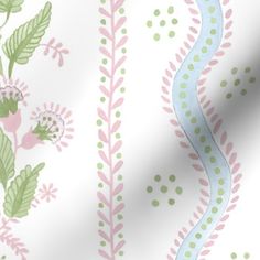 a white and green floral wallpaper with blue ribbon