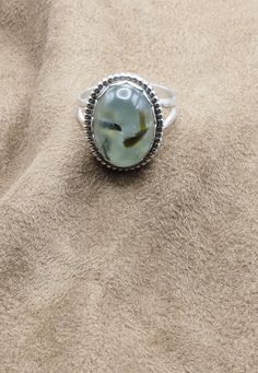 Unique Prehnite Ring US Size 10.   Can be sized for no additional charge. Top: 20mm x 17mm; 3/4" x 5/8" Weight 7.7 Grams Sterling Silver 925, Handmade $70 Exclusively Designed by Richard James for Richlo Jewelry Check out our other fine jewelry at: https://www.etsy.com/shop/arizonagemstudio Prehnite is considered a "stone of dreaming"; it is believed to increase the power of the dream state, strengthen lucid dreaming and promote communication with other planes of existence. It is also considered a "stone of prophecy," with long use by indigenous peoples of South Africa. Planes Of Existence, Prehnite Ring, Richard James, Green Valley, Us Size 10, Lucid Dreaming, Ring Handmade, The Dream, Sterling Ring