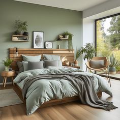 a bedroom with green walls and wooden furniture, including a bed covered in grey linens