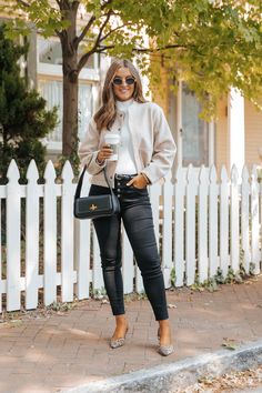 Be effortlessly stylish with this Bomber Jacket in Beige! The long sleeves and elastic back hem provide a comfortable fit, while the gold button detail adds a touch of elegance. With a snap button closure and side pockets, this jacket is as functional as it is fashionable. Lined for added warmth. Layer it over a basic tank top or bodysuit and then pair with jeans, ankle booties, and a matching crossbody bag for an elevated boho chic look! Chic Fall Outerwear For Business Casual, Chic Fall Business Casual Outerwear, Chic Long Sleeve Outerwear For Everyday, Trendy Business Casual Outerwear, Chic Long Sleeve Everyday Outerwear, Versatile Business Casual Outerwear For Fall, Versatile Long Sleeve Outerwear For Day Out, Fall Workwear Cardigan With Zipper Closure, Chic Long Sleeve Outerwear With Zipper Closure