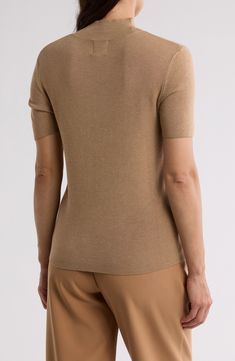 Enjoy the versatility of this short-sleeve sweater knit from soft, lightweight yarns with fine ribbed stitches. 24" length (size Large) Mock neck Short sleeves 83% rayon, 17% nylon Machine wash, tumble dry Imported Brown Short Sleeve Knit Sweater, Brown Fine Knit Turtleneck Top, Brown Knit Short Sleeve Sweater, Elegant Brown Fine Knit Top, Elegant Fine Knit Brown Top, Classic Brown Turtleneck Top, Brown Short Sleeve Tops With Ribbed Collar, Classic Brown Fine Knit Top, Brown Fine Knit Crew Neck Top