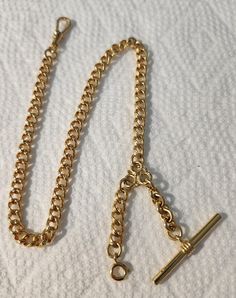 Pocket watch chain yellow gold plated 13" long. With T bar and swivel ends. Strong chain. Gold Pocket Watch Chain, Sorbet Shark, Gold Pocket Watch, Pocket Watch Chain, Watch Chain, Chain Link Bracelet, Nutcracker, Link Bracelets, Pocket Watch