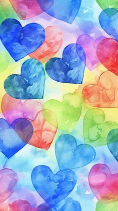 colorful hearts painted on watercolor paper