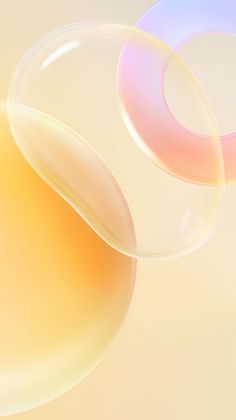 an image of soap bubbles floating in the air with pastel colors on it's surface