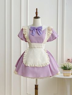 This price includes a dress and a purple bowknot.  Get ready to channel your inner maid with this stunning Purple Lolita Fashion Apron Dress. Complete with a charming bowknot on the neckline, this dress is perfect for anyone looking to add a touch of elegance and whimsy to their wardrobe. Whether you're attending a tea party or simply want to showcase your love for Lolita fashion, this apron dress is sure to turn heads and make you feel like a true fashionista.   	 		 			Size 			S 			M 			L Purple Maid Dress, Maid Outfit Aesthetic, Fashion Apron, Gothic Skirts, Matching Costumes, Maid Cosplay, Maid Outfit, Maid Dress, Apron Dress