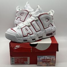 Elevate your style game with these Nike Air More Uptempo sneakers in size 8.5. The classic design features a white leather upper with Varsity Red accents, giving them a fresh and bold look. The mid-top shoe shaft style provides both comfort and support, making them perfect for any athletic activity. These 2018 release sneakers come from the renowned Nike Air More product line and are designed for men. The sneaker's model number is 921948-102 and they are ideal for those who love to rock a stylish and comfortable look. Don't miss out on the opportunity to add these sleek and trendy sneakers to your collection. Urban White Lace-up Basketball Shoes, White Streetwear Basketball Shoes, White Lace-up Skate Shoes With Logo, Sports Slip-on Sneakers With Red Sole, Casual Sneakers With Red Sole For Sports, Casual White Low-top Basketball Shoes, Red Sole Sports Sneakers With Round Toe, Urban White Basketball Shoes For Streetwear, White Urban Basketball Shoes For Streetwear