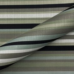 a striped fabric with black, grey and white stripes