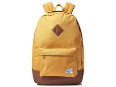 Herschel Supply Co. Heritage - Backpack Bags : Harvest Gold 1 : Limited lifetime warranty. Do you know your roots? The Herschel Supply Co. Heritage backpack certainly does. With a signature shape and feel, this sleek pack will help define your style for years to come. School backpack in a durable polyester with a spacious main compartment can hold books, clothes, or other daily essentials. Interior sleeve pocket can hold up to a 15 laptop. Additional front compartment with a key clip. Internal m Classic Nylon Backpack For Back To School, Classic School Backpack In Nylon, Classic Nylon School Backpack, Classic School Nylon Backpack, Classic Bags For Back To School, Heritage School, Define Your Style, Harvest Gold, Heritage Backpack