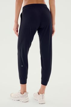 Our classic relaxed fit jogger in a new updated fit. Super soft Airweight fabric, designed for maximum versatility. BEST FOR: any workout or for casual wear. Model is 5'10" and wears a size small. Athleisure Joggers With 4-way Stretch And Elastic Side Panels, Athleisure Activewear With Comfort Stretch And Elastic Side Panels, Athleisure Activewear With Comfort Stretch, Black Comfort Stretch Joggers For Jogging, Black Comfort Stretch Joggers, Black Go-dry Athleisure Bottoms, Casual Black Moisture-wicking Yoga Pants, Versatile Joggers With Elastic Waistband For Gym, Versatile Gym Joggers With Elastic Waistband