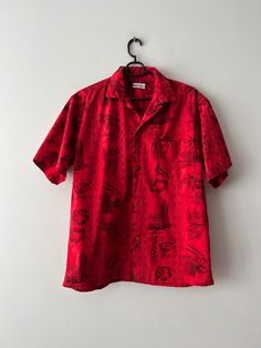 "Vintage Mens Short Sleeve Beach Shirt Hawaiian Shirt Bohemian Summer Singlet Button Up Shirt Size Medium Red Patterned Shirt  N.B. Real color might slightly differ from picture. Estimated  size: M Measurements: (lying flat) Length - 28\"/ 71 cm Shoulders: 19\"/ 48,3 cm Pit to pit: 22.5\"/ 57 cm Sleeve: 10\"/ 25.3 cm Please check measurements to insure a proper fit. Remember to allow yourself some extra room for movement. You can compare these with something from your closet that fits you well. Red Collared Hawaiian Shirt For Beach, Vintage Red Camp Shirt With Camp Collar, Red Retro Shirt With Camp Collar, Retro Red Shirt With Camp Collar, Retro Red Short Sleeve Camp Shirt, Red Collared Hawaiian Top, Red Collared Camp Shirt For Vacation, Red Hawaiian Shirt With Camp Collar, Casual Red Collared Hawaiian Shirt