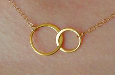 Forever linked together, two eternal circles form the center of this beautiful necklace. The two linked circles are in vermeil and catch the light beautifully. At the center of a gold filled chain and spring clasp, these symbols of eternity and love create a necklace of elegance, and simplicity. Jewelry Markings, Elk Ivory, Double Circle Necklace, Interlocking Circle Necklace, Best Friend Necklace, Circle Jewelry, Gold Circle Necklace, Wedding Ring Necklaces, Rings Necklace