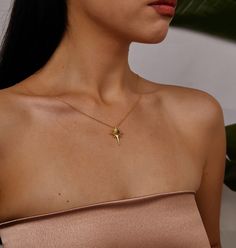 ✨ Illuminate Her World with the 14K Gold North Star Necklace Introducing our 14K Gold North Star Necklace, a captivating piece that combines elegance with a touch of magic. This necklace features a stunning North Star pendant, crafted from high-quality 14K gold, designed to guide and inspire. It's a perfect accessory for adding a touch of celestial charm to any outfit. 🌟 Projection Necklace with a Touch of Wonder Experience the enchanting effect of our projection necklace. The North Star pendan Gold Star Jewelry For Mother's Day, Gold Star-shaped Jewelry For Mother's Day, 14k Gold Star Necklace Perfect For Gifts, Northern Star Necklace, North Star Pendant, North Star Necklace Gold, Dainty Star-shaped Necklace For Gift, North Star Necklace, Summer Necklace