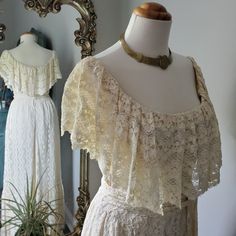 Handmade, I Believe 1970's, Lace Dress In An Ecru Color. Zips Up Back And Has A Long Tie To Wrap Around The Waist A Few Times. Can Be Worn Off The Shoulder. Its An Great Vintage Condition. I've Had This In My Closet A Long Time And Its Time To Find A Loving New Home For Her! Waist: 27" Cream Lace Vintage Dress For Summer, Vintage Lace Maxi Dress For Daywear, Vintage Lace Maxi Dress For Garden Party, Vintage Off-white Lace Dresses, Vintage Sleeveless Lace Maxi Dress, Vintage Summer Maxi Dress With Lace Trim, Vintage Spring Maxi Dress For Weddings, Vintage Style Maxi Dress For Spring Wedding, Bohemian Cream Vintage Dress For Daywear