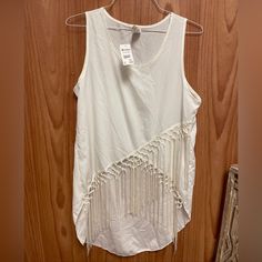 Perfect For Spring And Summer! Festival Fringe Sleeveless Tank Top, Sleeveless Cotton Tops For Festival, Sleeveless Fringe Tops For Festival, Bohemian Fringe Sleeveless Tank Top, Casual Sleeveless Fringe Top, Cotton Sleeveless Vest For Festival, White Spring Festival Vest, White Sleeveless Festival Vest, White Vest For Spring Festival