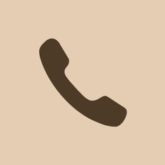 a brown phone icon on a beige background