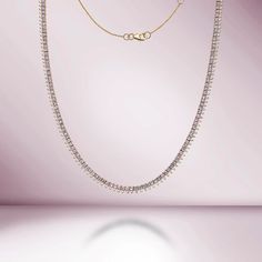 Handmade in New York of polished 14k white gold, CAPUCELLI's Tennis necklace showcases a delicate box chain embellished with dozens of shimmering white diamonds.Beautiful Diamond Tennis Necklace. A staple in your jewelry collection. Handmade in New York City of polished 14k white gold. This tennis necklace showcases a 14k Yellow Gold Necklace, Diamond Tennis Necklace, Round Sapphire, White Gold Necklaces, Tennis Necklace, Timeless Jewelry, Rose Gold Necklace, Sapphire Diamond, Jewelry Pouch