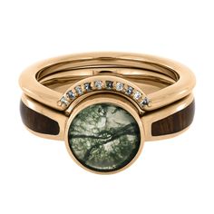 two rings with trees and diamonds on them