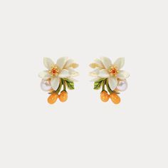 Orange Blossom Earrings show orange flower beauty and set off charming earlobes. They have enamel paint to look more vivid. These are nature jewelry from Selenichast jewelry store. Our Orange Blossom Earrings have been crafted from fine brass and enamel to create a beautiful, timeless look. Hang these perfectly balanced earrings from your lobes for an eye-catching addition to any outfit. Their subtle hints of color and cottage-inspired design make them the ideal gift for a loved one. Allow them Lily Of Valley, Fleur Orange, Fruit Jewelry, Orange Earrings, Gelang Manik, Dope Jewelry, Funky Jewelry, Jewelry Lookbook, Orange Flower