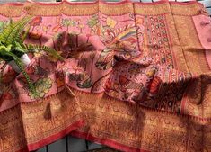 Kalamkari Saree/Fall And Saree Edges Are Done/Ready to where /Soft Silk Floral Digital Print/Big Border/Multi Dork Pink Color/Indian Saree  Style, Kalamkari Digital Print Soft Silk Light Weight Party where Dally where Occasion,  DETAILS:  Blouse Piece: One Saree and One blouse Pice/ Fall:  DONE, Stitched Already  Edges:  DONE, Saree Edges Stitched Already Material Soft Silk Kalamkari Design,11 (inch Gold Border  Saree weight: 1lb (500 g)  Meters ; Saree Dimensions: 208 inches (5.283meters) long. Blouse Piece Dimensions:  by 44 inches Long wide 25 ( meters).  Saree color: Dork Pink/ Mutti Colar All over Saree  Pallu color: Dork Pink /Brit Pink Border color: Red Pink  Blouse piece color: Pink Red  Flower Print  PRODUCT CARE: - Dry-clean or hand-wash. Do not machine-wash. Recommend spot-testi Pink Kalamkari Print Saree, Pink Art Silk Saree With Kalamkari Print, Pink Unstitched Kalamkari Traditional Wear, Unstitched Pink Kalamkari Traditional Wear, Pink Bollywood Saree With Kalamkari Print, Pink Kalamkari Traditional Wear For Navratri, Pink Unstitched Kalamkari Print Saree, Pink Unstitched Saree With Kalamkari Print, Pink Chanderi Traditional Wear With Kalamkari Print