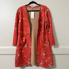 Solitaire Anthropology Faux Suede Orange Boho Open Front Duster Jacket -Nwt -Lightweight -Two Front Pockets -Faux Suede -Boho Floral Print -Open Front Approx. Measurements Pit To Pit 20" Length 35" *37 Chic Red Outerwear For Layering, Red Spring Outerwear With Pockets, Red Long Sleeve Outerwear For Spring, Chic Long Sleeve Lined Outerwear, Red Open Front Outerwear For Fall, Red Fitted Open Front Outerwear, Duster Jacket, Anthropology, Boho Floral