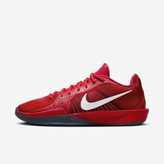 the nike zoom basketball shoe is red and white, with a black bottom stripe on the upper