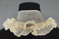 Muslin Neck Ruffle, 1780's with double finely pleated ruffle sewn to the flat inner section, caught at the front neck , the two pleats 2 in/5 cm deep, length when lying flatapprox 22 in/56 cm. http://www.meg-andrews.com/item-details/Muslin-Neck-Ruffle/8260 Georgian Dress, Ruffle Neck Dress, 18th Century Women, Victorian Accessories, European Dress, Antique Dress, Neck Ruffle, Mood Board Fashion, Vintage Tops