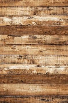 an old wood planked wall with white paint