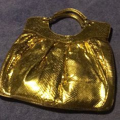 Metallic Gold Tone Snakeskin Bag. Blue Interior, Zip Closure. Great Condition! Never Used Luxury Evening Tote Bag With Gold-tone Hardware, Luxe Gold Leather Bag, Gold Leather Shoulder Bag With Top Carry Handle, Travel Tote Evening Bag With Gold-tone Hardware, Luxury Gold Bag With Top Carry Handle, Luxury Gold Shoulder Bag With Top Carry Handle, Luxe Rectangular Shoulder Bag For Shopping, Modern Gold Satchel For Formal Occasions, Modern Gold Handheld Shoulder Bag