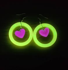 Quirky fun glitter neon color earrings. Punk Multicolor Party Jewelry, Green Heart Shaped Earrings For Parties, Multicolor Punk Jewelry For Parties, Trendy Neon Jewelry For Party, Green Heart Earrings For Valentine's Day Party, Trendy Luminous Jewelry For Gifts, Trendy Neon Yellow Jewelry For Party, Neon Yellow Trendy Jewelry For Party, Trendy Neon Yellow Earrings For Gifts