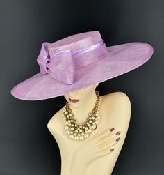 Note: The design of this hat, particularly the shallower crown, was crafted to create a unique aesthetic that suits some individuals perfectly. However, if you notice that the hat tends to slip, I would advise attaching an elastic strap to ensure a more secure and comfortable fit. ✿*.Key Features.*✿ This is a wide flat brim hat!! It's made of sinamay (3 layers ) and satin.  A nice sinamay bow is trimmed with satin ribbon too, very cool, one of my favorite hats! High quality. It's more beautiful in person! Great for Kentucky derby, weddings, church, Easter, Royal Ascot, horse races, cocktails, tea party, or any hat wearing occasion. Hat base size: From front to back: 19" (48cm) From left to right: 18.25" (46cm) Wide brim appr: 6" (15cm) Crown Depth: 3.5" (9cm) Hat girth: 21" (53.34cm). It f Purple Curved Brim Hat For Wedding, Purple Wide Brim Hat For Races, Luxury Purple Hat For Formal Occasions, Luxury Purple Hat For Kentucky Derby, Luxury Purple Wide-brim Hat, Sinamay Fascinator, Tee Party, Easter Hat, Royal Ascot Hats