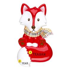 a red and white ceramic fox ornament with the year 1 on it's side