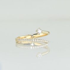 💙 14k Solid Gold Open Band Ring, Real Gold Unique Design Pave Setting Ring For Her with premium grade D Color (colorless) VS/SI clarity moissanite.  💙 Our jewelry is handcrafted with love and great care at San Francisco Bay! All of our items are 14k stamped for authenticity. 💙 You will receive them exactly as pictured. We don't use any filters, all photos are authentic and unedited.   💙 Dimensions: Band thickness: 1.6 mm - 3.0 mm.  💙 The ring material is 14k Solid gold, should not be confused with gold plating or filling. It won't tarnish or fade over time. 💙 We're offering the finest quality in solid gold jewelry. 💙 Quick shipping - Your order will be handcrafted and shipped in a few days. 🎁 They are delivered in a nice jewelry box, ready to be presented as a precious gift. 💎 Moi Minimalist Jewelry With Brilliant Cut Open Band, Minimalist Open Band Jewelry With Brilliant Cut, 14k Gold Bypass Ring With Single Cut Diamonds, Fine Jewelry With Vvs Clarity Open Band, 14k Gold White Rings With Vvs Clarity, 14k Gold White Ring With Vvs Clarity, White 14k Gold Ring With Vvs Clarity, White 14k Gold Rings With Vvs Clarity, Dainty Open Band Ring With Vvs Clarity