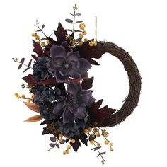 a wreath with purple flowers and yellow berries