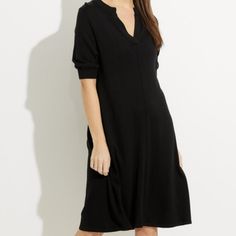 Sheri Dress Boasts A Flattering A-Line Silhouette, A Classic Fit That Works For All Types Of Figures. Its Focal Point Is Its Rounded Neckline With Cut-Out Detailing, Which Adds A Playful Touch To The Otherwise Polished Look. It's The Embodiment Of Casually Chic Thanks To Its Soft, Stretchy Blend. Length 41" P2p 23" 60% Rayon 40% Cotton Black V-neck Shirt Dress Casual, Casual Black V-neck Shirt Dress, Knee-length Black Shirt Dress For Daywear, Classic Black Midi Dress For Daywear, Black Knee-length Shirt Dress For Daywear, Black Mid-length Dress For Daywear, Black Mid-length Daywear Dress, Elegant Black Split Neck Dress, Fall Daywear Dress With Split Neck