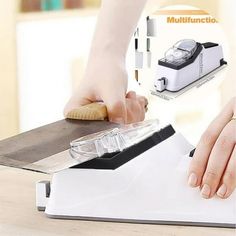 a person is using a knife to cut something on a cutting board with a sharpener