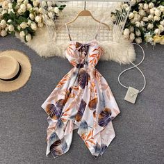 Spaghetti strap vacation dres, irregular, stylish, printed beach dressMaterial:blendedStyle:stylishFeatures:irregular,printedColor:apricot,blue,redSize(cm):free 1inch=2.54cmLength 91, bust 70-84 , waist:76&ltp&gtNote:Due to different measurement methods,there will be 1-3 error(unite:cm), please understand.</p>&ltbr/>&ltp&gtPlease check the size carefully when you choose items,thank you.</p>&ltbr/> Backless Summer Dress, Printed Beach Dresses, Cold Fashion, Backless Dress Summer, Summer Dress Women, Irregular Dress, Preppy Dresses, Cute Dress Outfits, Long Skirts For Women