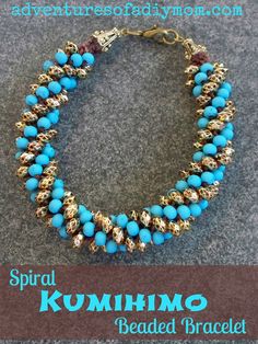 the beaded bracelet is made with gold and turquoise beads