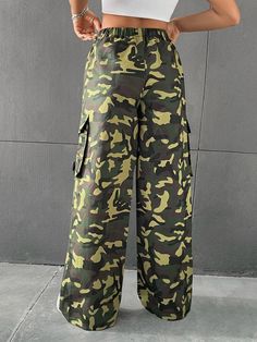 Add a touch of urban coolness to your wardrobe with our Camo Drop Cargo Pant. These pants feature a trendy camo print and a drop waist design, creating a unique and fashionable look. The cargo pockets offer functionality and enhance the overall style. Made from high-quality fabric, these pants are perfect for those who want to make a statement while staying comfortable. Specification: Style: Casual Type: Cargo Pants Details: Pocket Waist Line: Drop Waist Length: Extra Long Fit Type: Regular Fit Combat Pants With Pockets For Fall, Fall Combat Pants With Pockets, Combat Pants With Cargo Pockets For Fall, Fall Combat Wide Leg Cargo Pants, Camouflage Utility Bottoms, Camouflage Parachute Pants With Cargo Pockets, Full Length Camouflage Bottoms With Cargo Pockets, Camouflage Utility Long Pants, Camouflage Utility Trousers