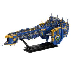 a blue and yellow model of a ship