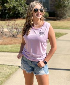 The ultimate slouchy tank! This muscle tank is perfect for a gym session or morning run, or just paired with fun denim shorts!  Be sure to add a monogram for a personalized touch!* 3.5 oz., 91/9 polyester/combed and ringspun cotton, 40 singles* Low cut armholes* Curved bottom hem* Relaxed, drapey fit* Side seams Relaxed Fit Summer Athleisure Tank Top, Athleisure Summer Tank Top For Everyday, Summer Athleisure Tank Top For Everyday, Athleisure Tank Top For Everyday Summer Use, Trendy Letter Print Activewear For Spring, Casual Spring Muscle Tee For Sports, Casual Muscle Tee For Sports In Spring, Sporty Tank Top For Everyday Summer Use, Spring Workout Muscle Tee Casual Style