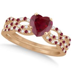 a heart shaped ruby and diamond ring set