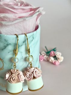 "Luxurious box of flowers that can last forever! Each box/each side comes with 6 pink and blush roses and each petal is hand cut and hand sculpted so they are all one of a kind. The hooks are 18k real gold plated brass. Drop length is about 2.2\" (measured from the top of ear wire to the bottom of the box) Length of the box of flower is 0.9\" and it is 0.6\" wide" Box Of Roses, Box Of Flowers, Polymer Clay Flower Jewelry, Handmade Clay Jewelry, Mixed Media Jewelry, Roses Pink, Polymer Clay Flowers, Whimsical Fashion, Blush Roses