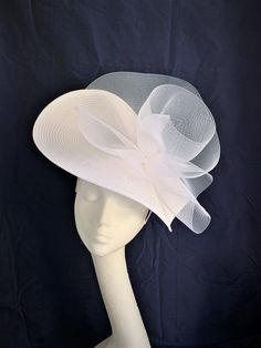 White saucer disc hat White saucer disc hat made of white polybraid base attached to the silk-covered headband. On the top is sitting a white twisted crinoline. The look is very light and transparent. The hat is very elegant and light to wear. A white saucer disc hat will be an amazing accessory to compliment your outfit at the Royal Ascot races, Kentucky Derby races, Weddings, or Garden parties. The white hat will fit the average head size. To secure your fascinator there is a comb inside the h White Straw Hat With Curved Brim, White Adjustable Flat Brim Costume Hats And Headpieces, Adjustable White Boater Hat With Curved Brim, White Adjustable Boater Hat With Curved Brim, Adjustable White Boater Hat, Fitted White Hat With Curved Brim, White Fitted Hat With Curved Brim, Adjustable White Straw Hat For Kentucky Derby, Adjustable White Brimmed Hat