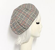 Red black white plaid vintage cotton blend Beret Hat, lined in rayon print, the top of the hat is made up of 6 section crown, wool bias 1" fitted band and has a soft 1"elastic band inside. One size fits most and will fit up to a 22" Made in USA Hand wash / dry Adjustable Plaid Flat Cap, Retro Adjustable Beret For Fall, Adjustable Retro Beret For Fall, Retro Adjustable Flat Cap Beret, Adjustable Retro Flat Cap Beret, Adjustable Retro Style Flat Cap Beret, Plaid Beret, Beret Hat, Vintage Cotton