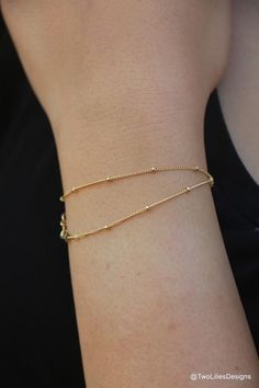 This contains an image of: {{ pinTitle }} Adjustable 14k Gold Filled Bracelets With Satellite Chain, Dainty Satellite Chain Bracelet For Everyday, Adjustable Minimalist Satellite Chain Bracelet, Adjustable Minimalist Gold Bracelet With Satellite Chain, Delicate Gold Plated Bracelet With Chain, Dainty Delicate Chain Bracelets For Layering, Everyday 14k Gold Satellite Chain Bracelet, Dainty Adjustable Gold Bracelet With Satellite Chain, Delicate Gold Bracelet With Satellite Chain For Everyday