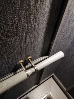 the inside of an airplane with its door open and some writing on the window sill