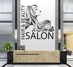 the salon sign is hanging on the wall